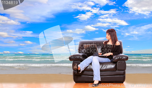 Image of Young woman on couch