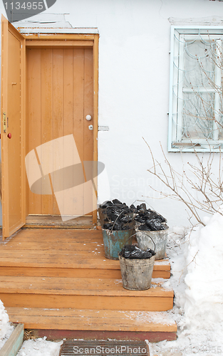 Image of Buckets of coal for heating stove