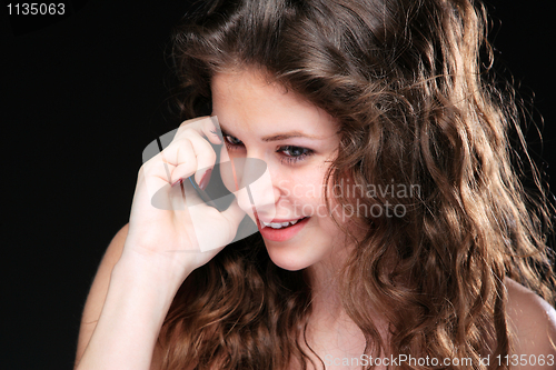 Image of Portrait of glamor woman talking on the phone 