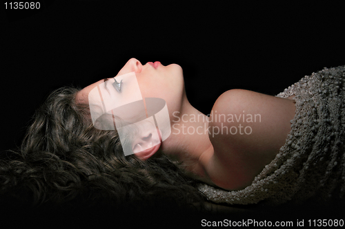 Image of Portrait of a pretty young woman relaxing 