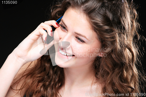 Image of Portrait of glamor woman talking on the phone 