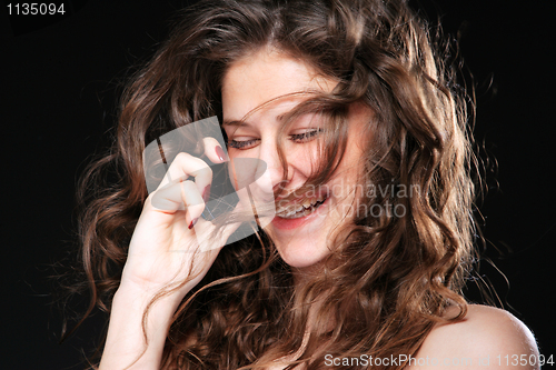 Image of Portrait of glamor woman talking on the phone 