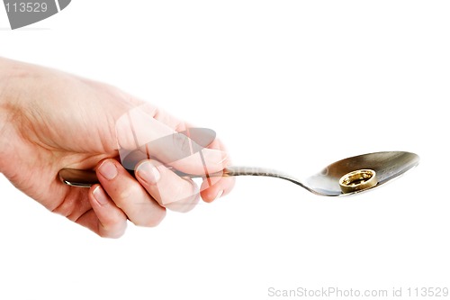 Image of Spoon in Hand