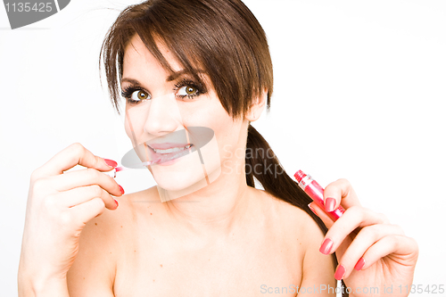 Image of applying make-up