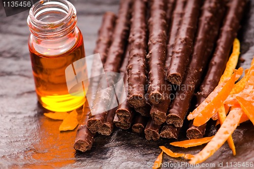 Image of chocolate sticks with orange