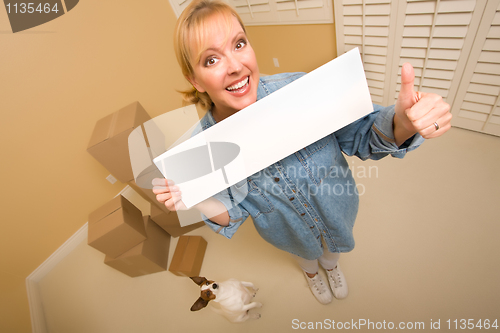 Image of Woman and Doggy with Blank Sign Near Moving Boxes