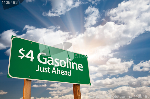 Image of $4 Gasonline Green Road Sign and Clouds