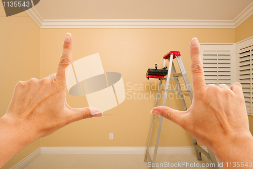 Image of Female Hands Framing Beautiful Room Interior