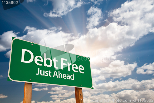 Image of Debt Free Green Road Sign and Clouds