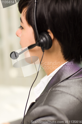 Image of Profile of Attractive Young Mixed Race Woman Smiles Wearing Head