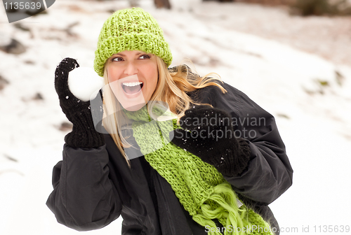 Image of Attractive Woman Having Fun in the Snow