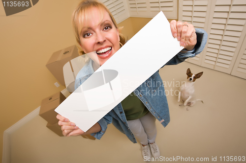 Image of Woman and Doggy with Blank Sign Near Moving Boxes