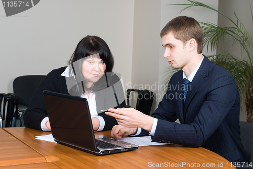 Image of Businessmen with laptop