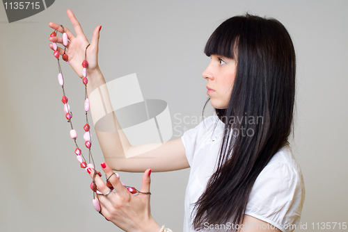 Image of Woman with beads