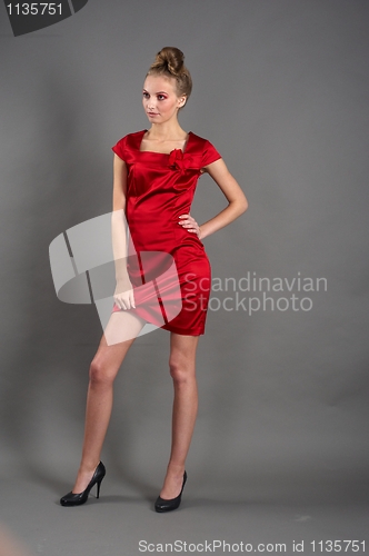 Image of Sexy slim woman in red dress