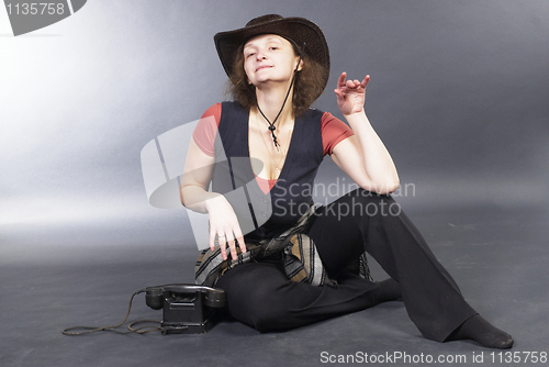 Image of Beautiful lady in a cowboy hat