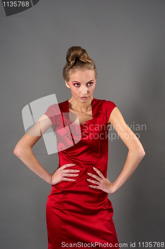 Image of Sexy slim woman in red dress