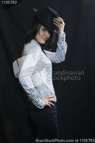 Image of Woman with necktie and hat