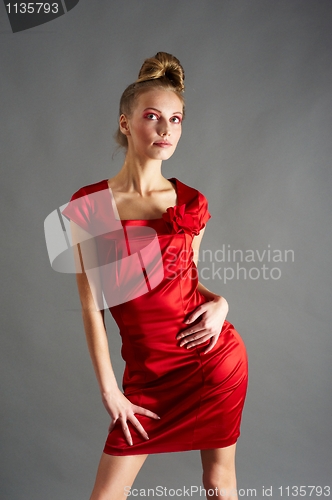 Image of Sexy slim woman in red dress
