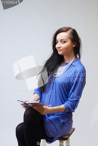 Image of Beatiful girl with cd