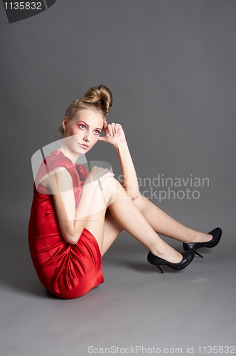 Image of Sexy slim woman in red dress