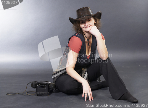 Image of Beautiful lady in a cowboy hat