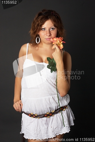 Image of Young Lady with red rose