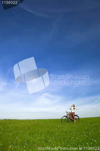 Image of Girl with a bicycle