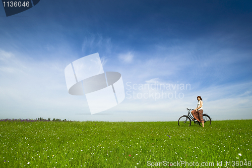 Image of Girl with a bicycle