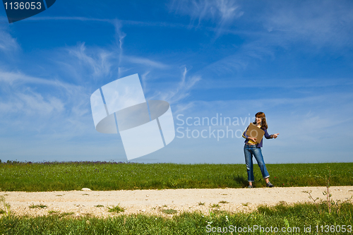 Image of Hitch hiking girl