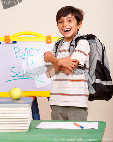 Image of Happy student in his classroom