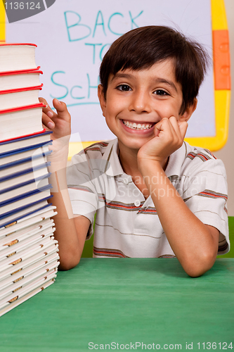 Image of Young school kid smiling at camera