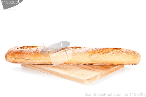 Image of baguette on the wooden board