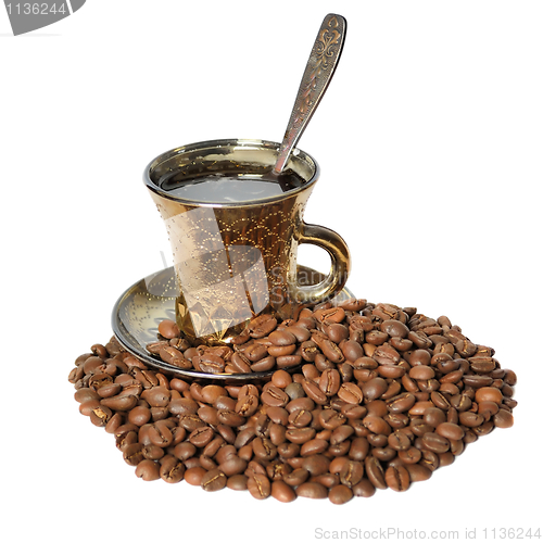 Image of A cup of coffee and coffee beans