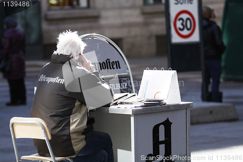 Image of Newspaper Salesman