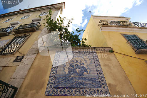Image of Old houses with a beautiful tile picture