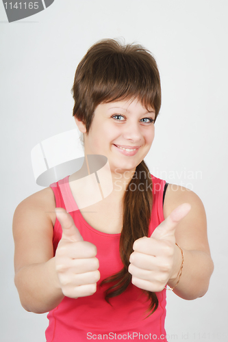 Image of happy girl with thumbs up