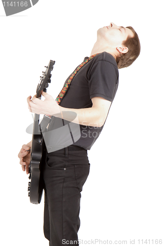 Image of young man with a guitar