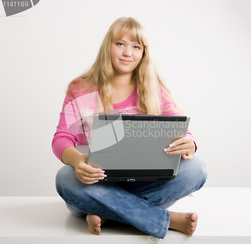 Image of blonde with a laptop