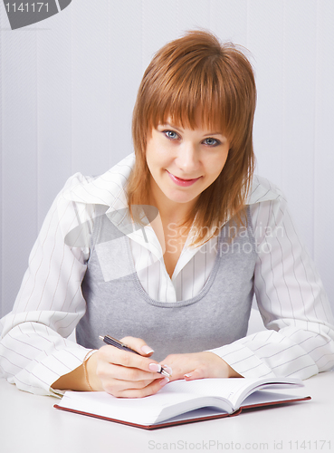 Image of Girl with a notebook