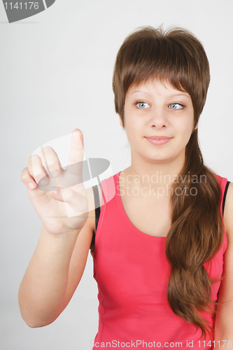 Image of girl presses the button