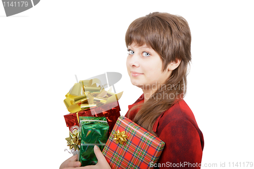 Image of attractive young woman with gift boxes