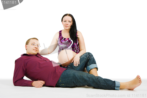 Image of a young couple. Pregnancy