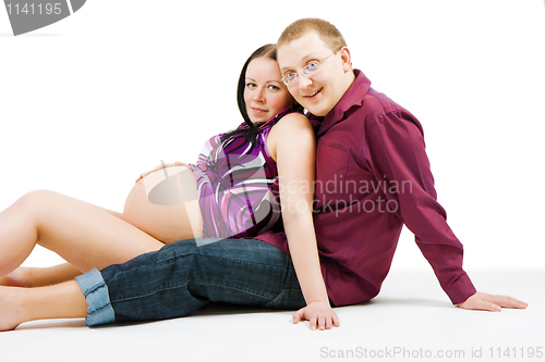 Image of happy couple on a white background. Pregnancy