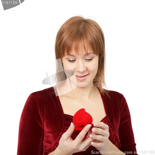 Image of young girl with a box for rings