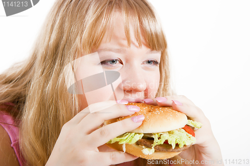 Image of The young woman and hamburger