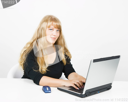 Image of young girl working on laptop