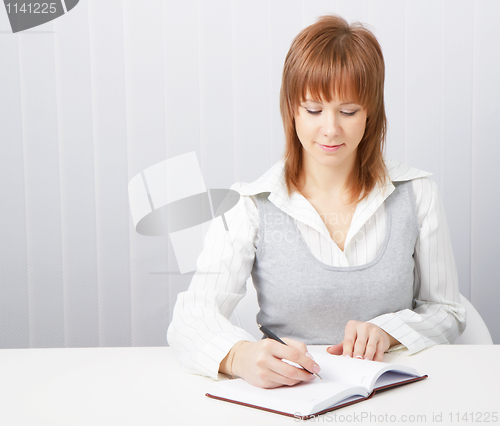 Image of Girl with a notebook