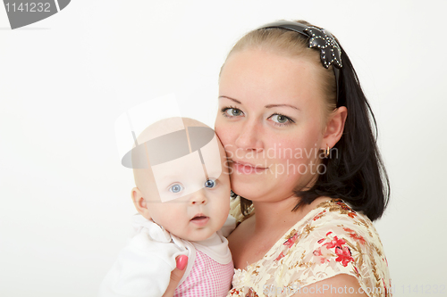 Image of baby on his mother's arms