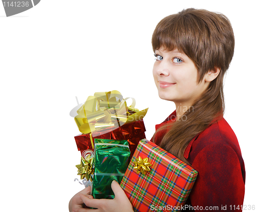 Image of attractive young woman with gift boxes